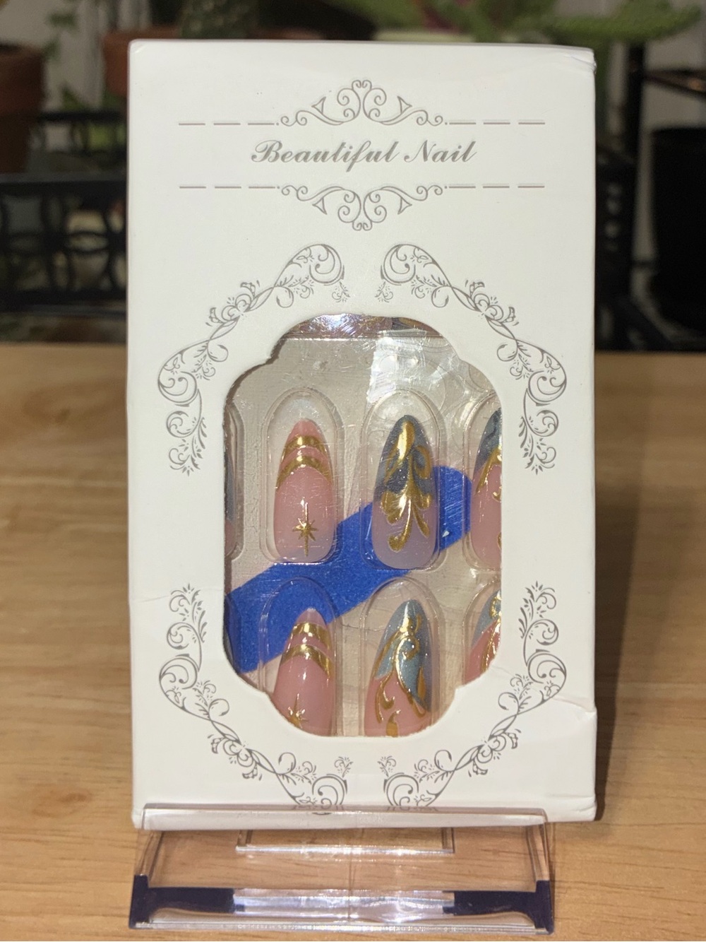 Elegant Gold Foil & Blue Accent Nude Press-On Nails
